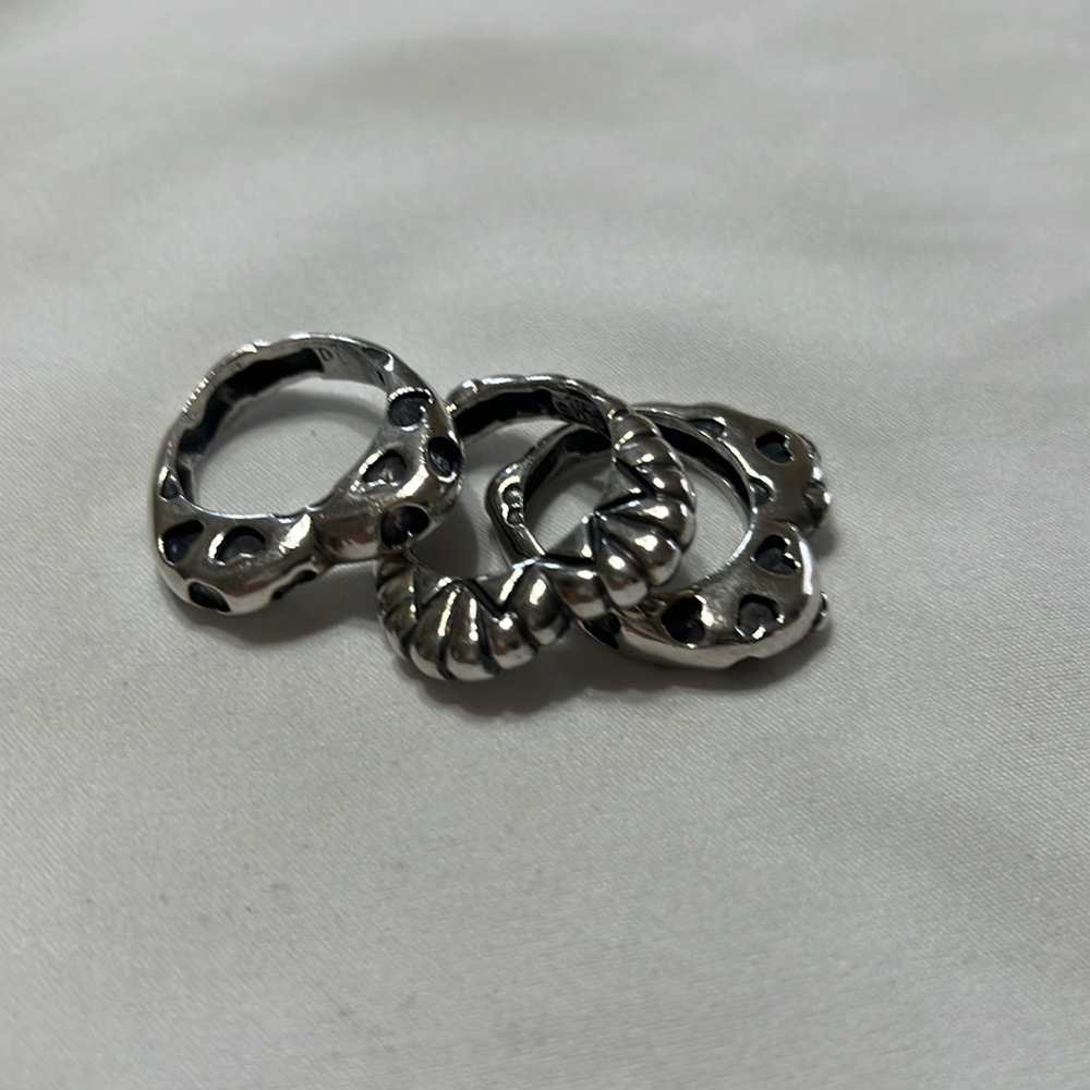 Dian Malouf Rare heart shape stackable Sterling silver set of 3 rings.